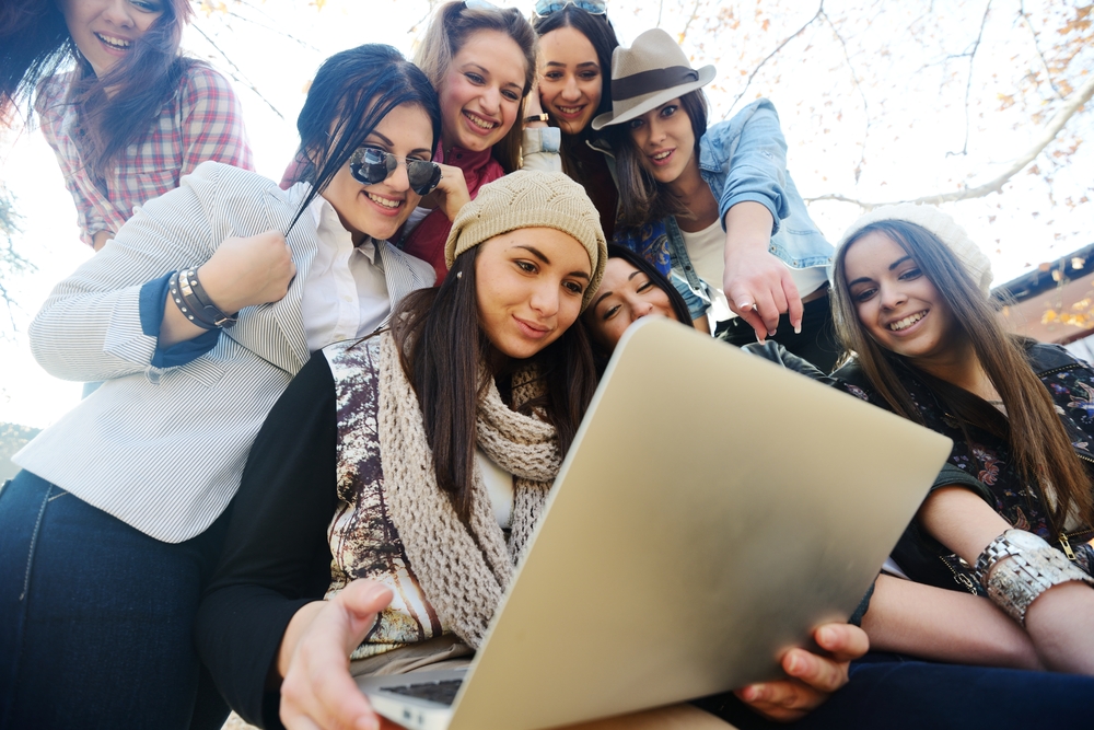 image of young girls looking at small business website design
